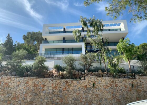 Modern apartment with sea views and pool in Cas Catala